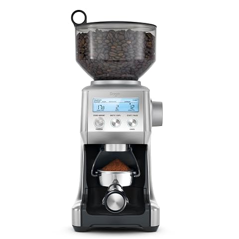 Moulin à café électrique Sage en acier inoxydable brossé posé sur un plan de travail en bois