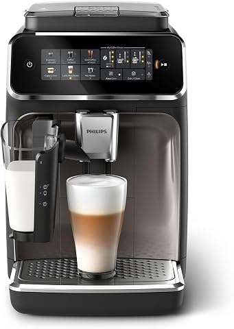 Machine à café à grain noire et chromée avec broyeur intégré et carafe LatteGo sur un plan de travail