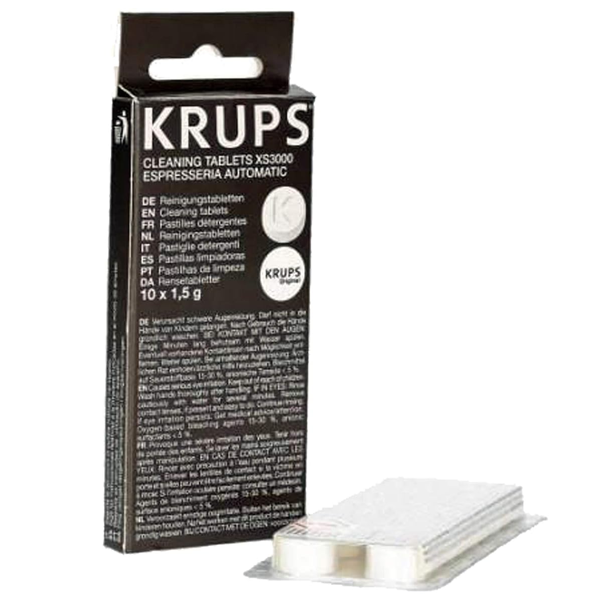 Dix pastilles nettoyantes Krups disposées sur un plan de travail en bois brun