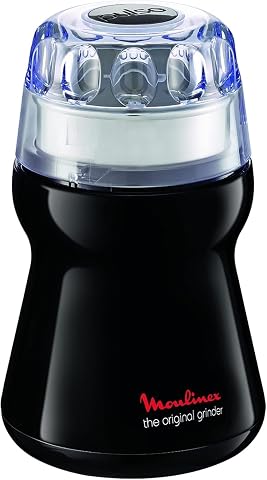 Moulin électrique noir Moulinex Dehli avec couvercle transparent sur un plan de travail en bois