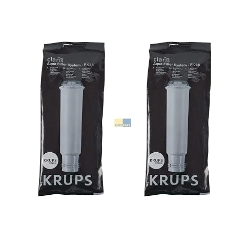 Deux cartouches filtrantes Krups Claris F088 posées sur un plan de travail en bois