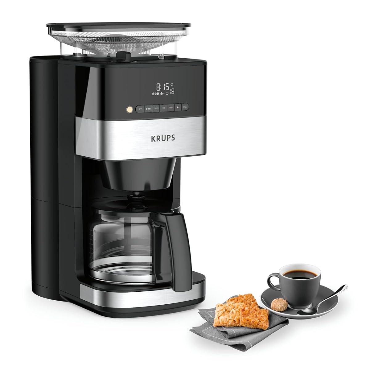 Cafetière filtre Krups noire avec broyeur intégré et détails en acier inoxydable mat