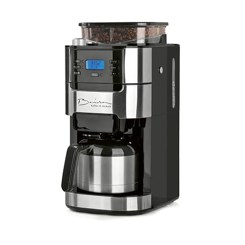 Cafetière filtre argentée avec broyeur intégré et verseuse isotherme sur un plan de travail en bois