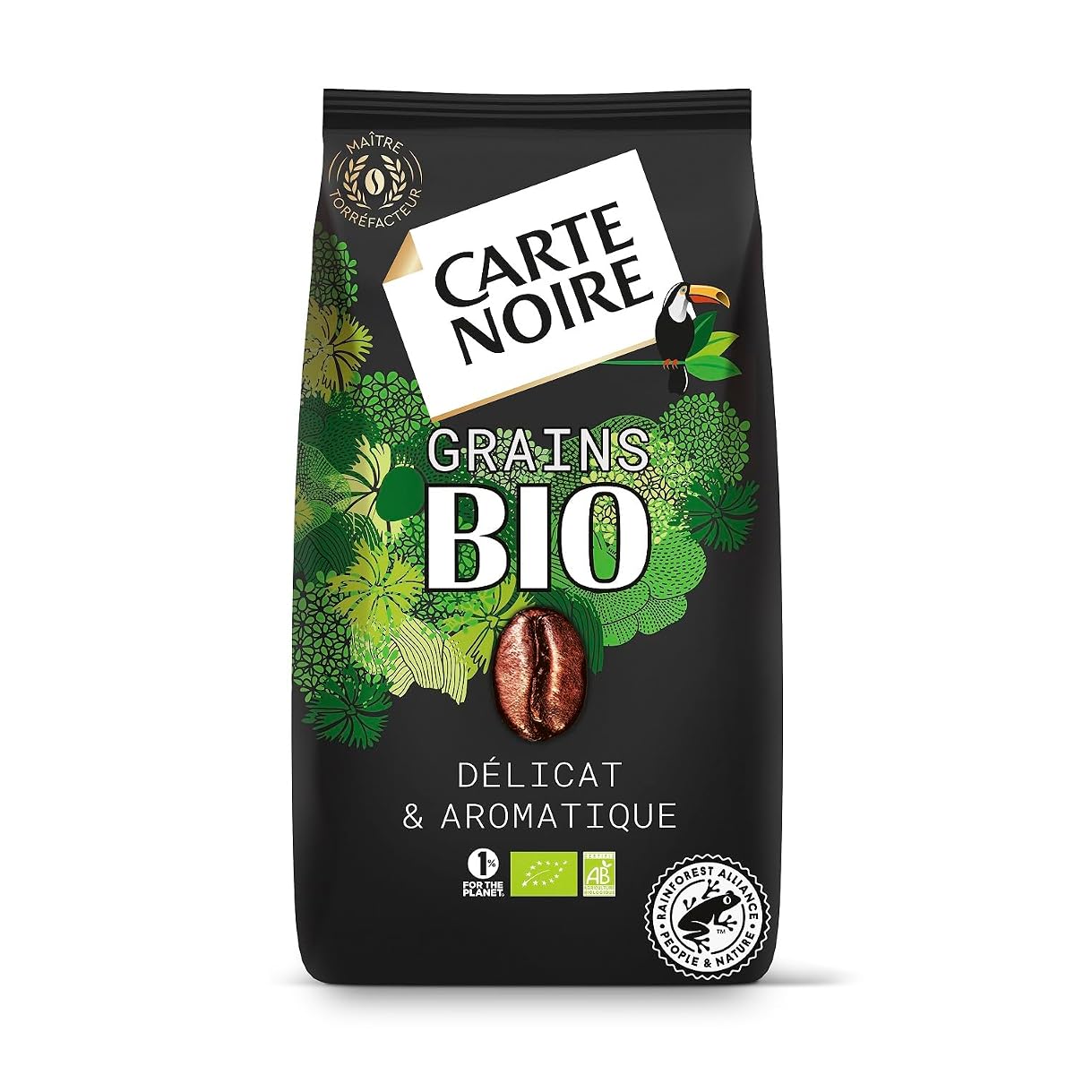 Grains de café Arabica bruns présentés sur un plan de travail en bois avec un bol en céramique