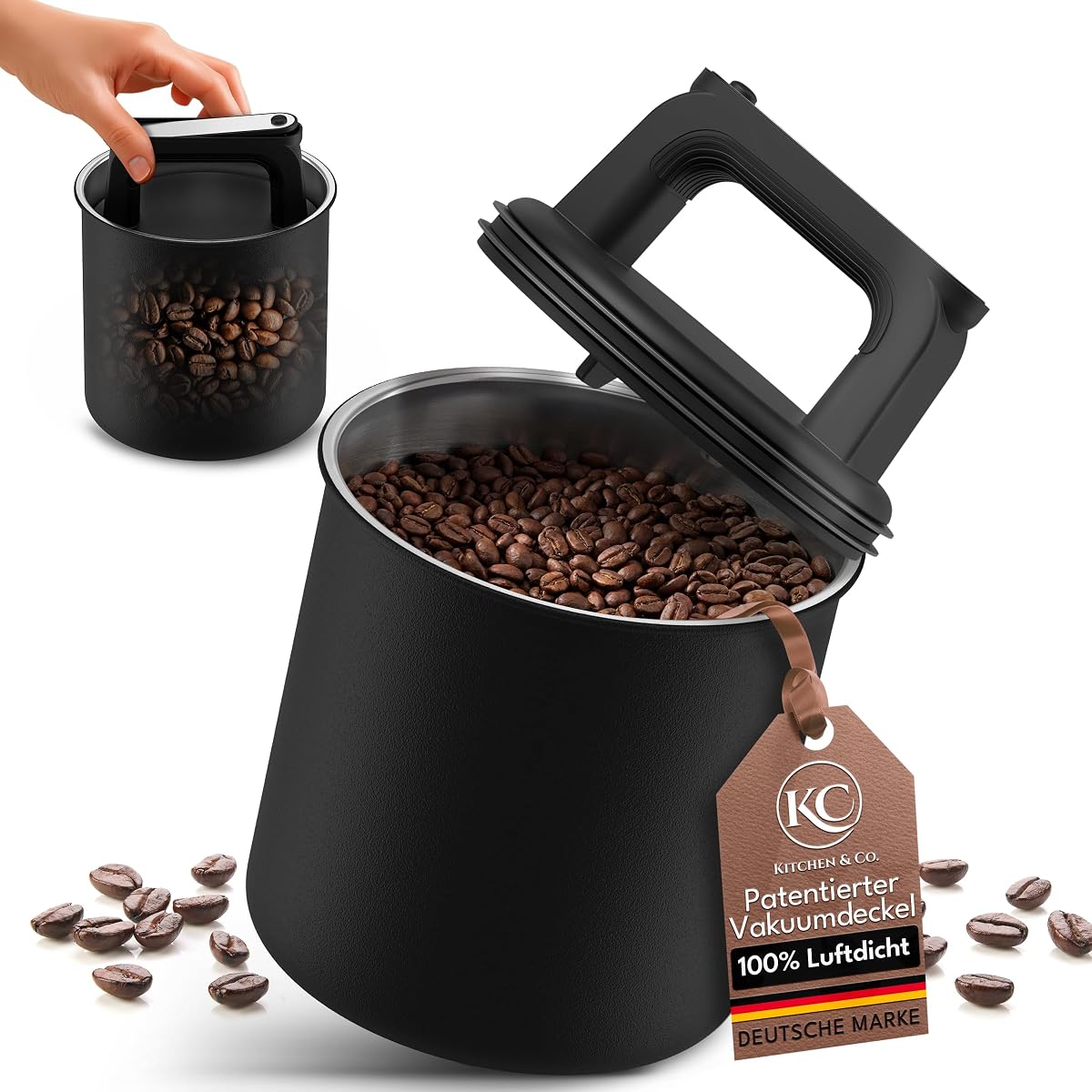 Boîte à café noire en acier inoxydable avec couvercle sous vide, posée près de grains